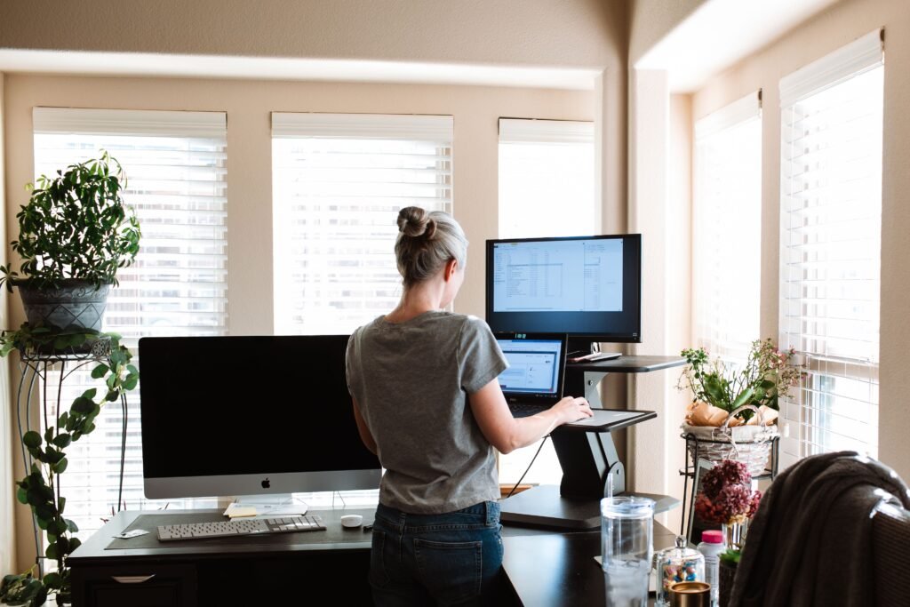 Person making comfortable adjustments while living with chronic pelvic pain.